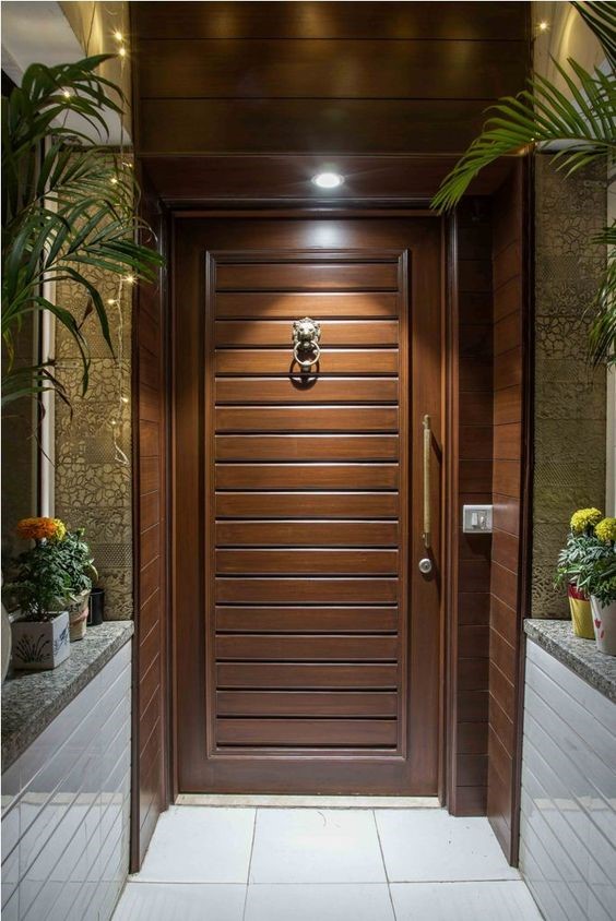 Add a knocker to your wooden safety door design